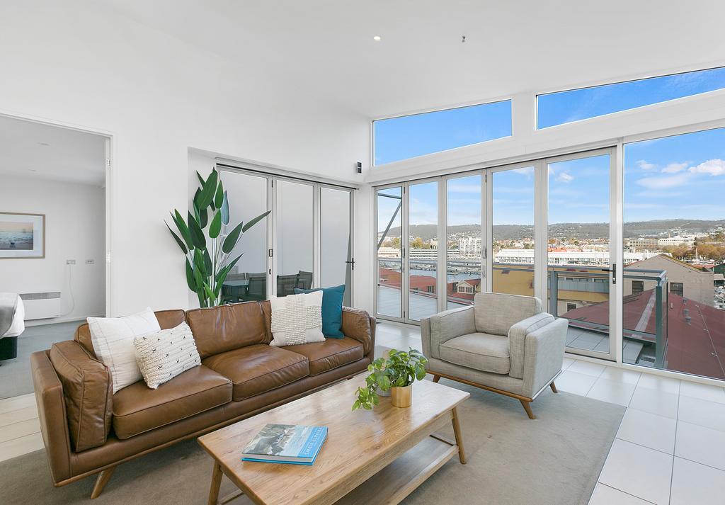 Sullivans Cove Apartments Hobart Esterno foto A staged living room